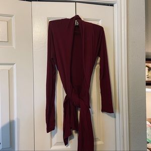 Burgundy sweater from Neiman Marcus line . Very versatile. One size